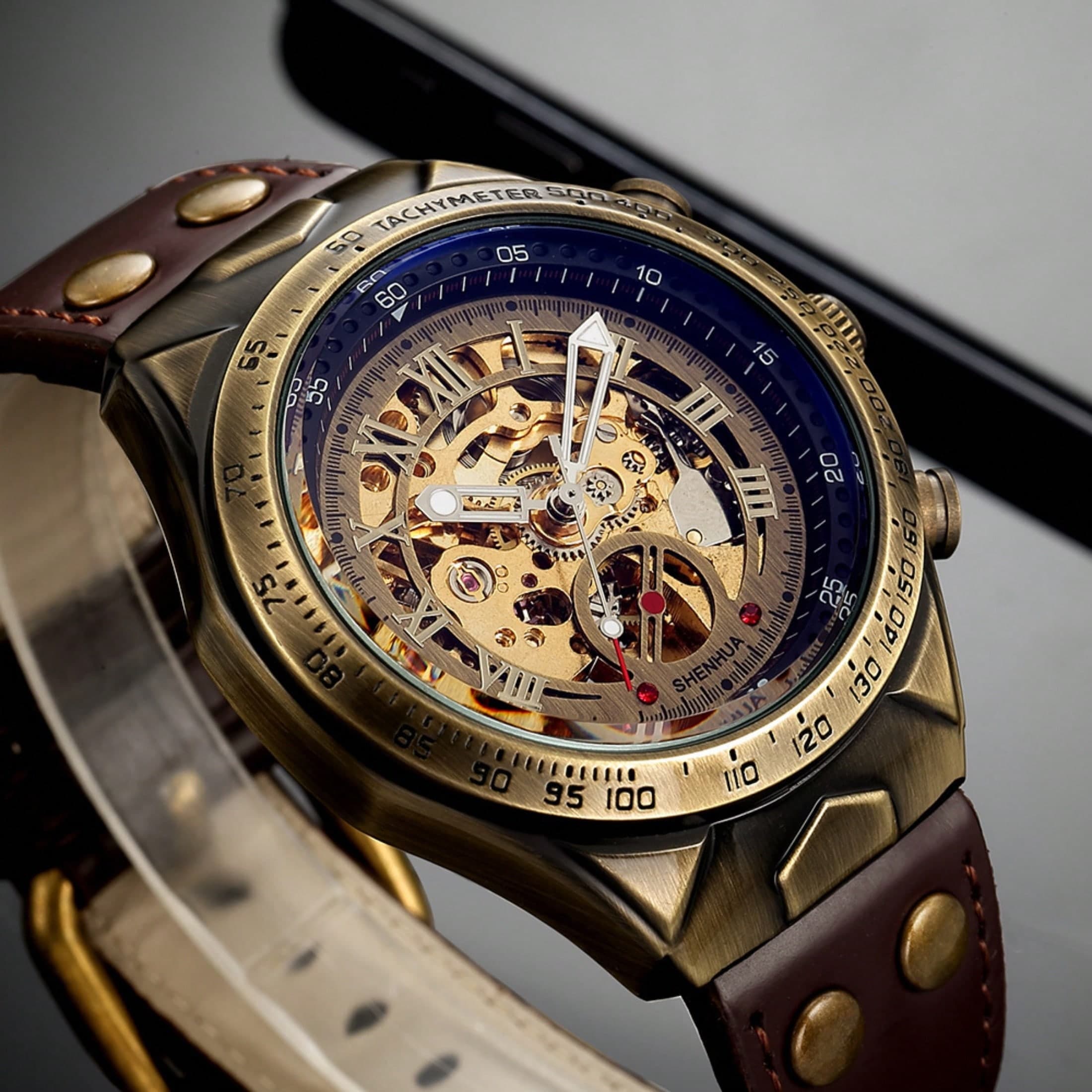 1 pièce Montre pour hommes automatique mécanique de couleur bronze antique avec bracelet marron, cadran squelette à engrenages à découpe, dos